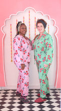 Load image into Gallery viewer, Two people wearing matching pajama sets on a checkered floor.
